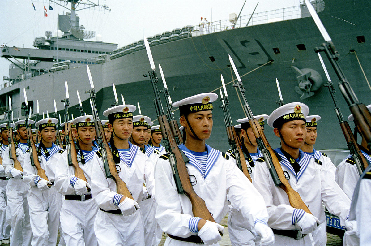 People's Liberation Army Navy sailors at the Qingdao, North Sea Fleet headquarters parading in 2000 for a visiting U.S. Navy delegation.