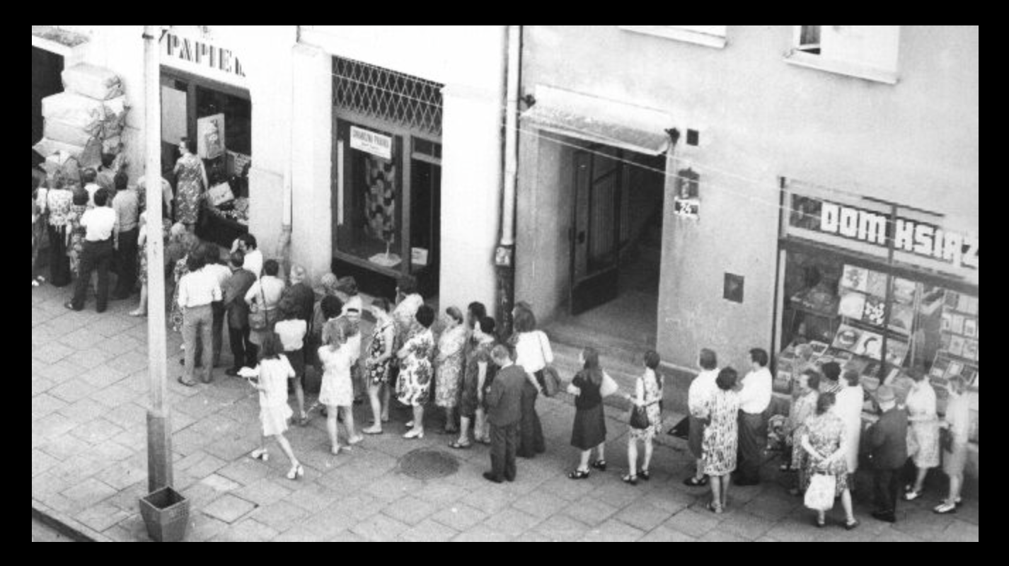 Line of shoppers in front of a Polish shop in the 1980s. A common sight in Warsaw pact countries ruled by communism.